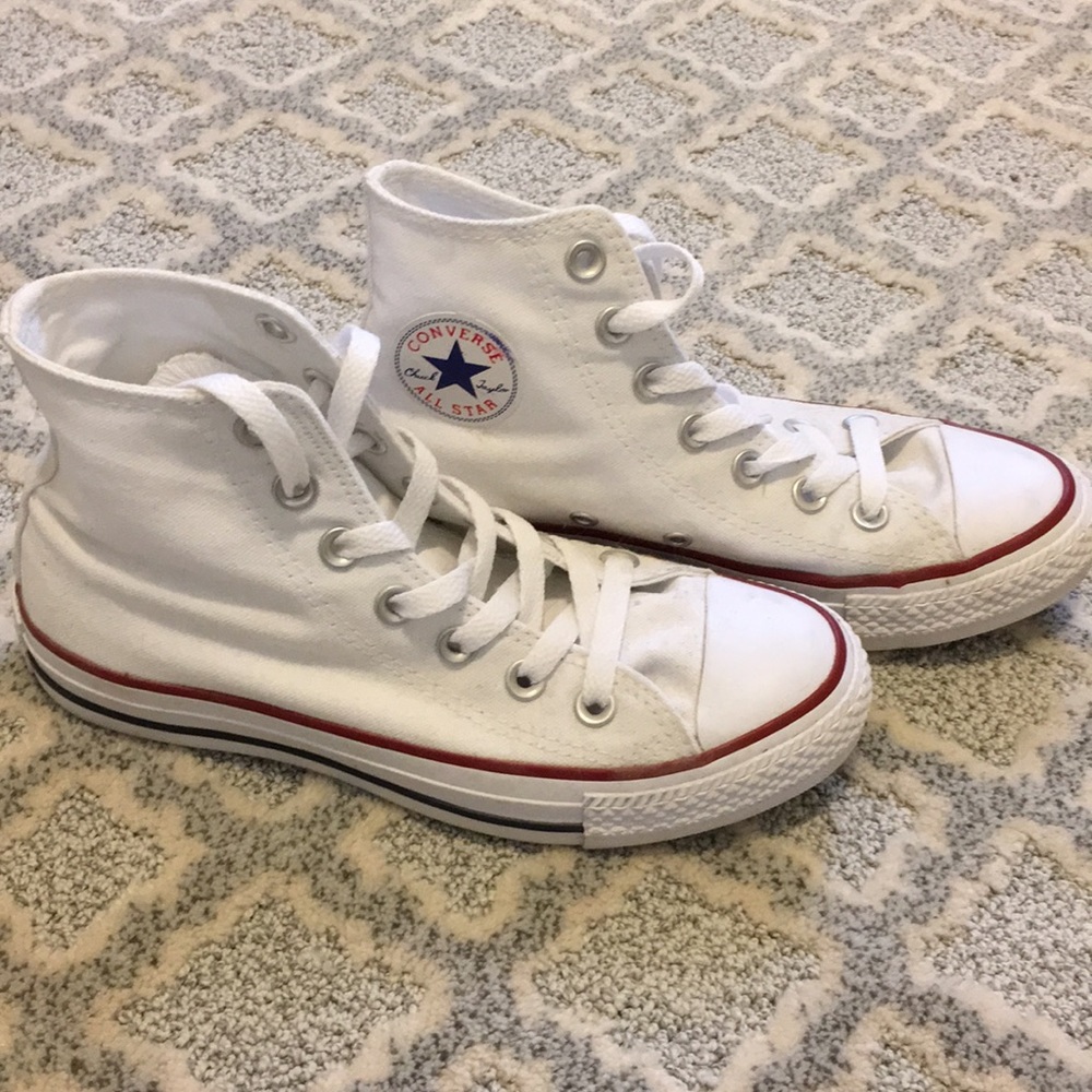 White Converse high tops.